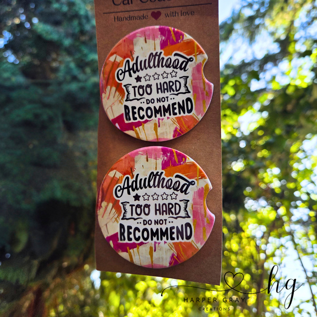 Set of 2 “Adulthood: Too Hard, Would Not Recommend ★☆☆☆☆” Car Coasters – Funny Cup Holder Accessories